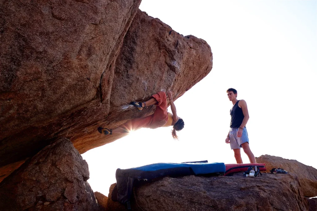 2 people bouldering